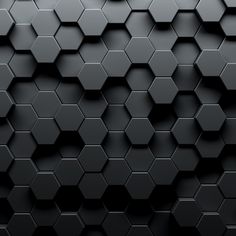 an abstract black background with hexagonal tiles in the shape of honeycombs