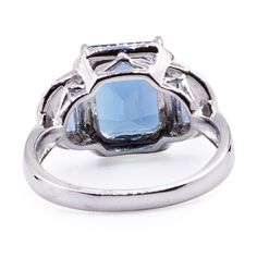 Center Stone: Natural London Blue Topaz Shape: RadiantColor: BlueApproximate Measurement: 10x8mm Gem Quality: AA Side Stones: Half Moon 6x3mm Item#: NGC-024 *Natural gemstone colors occur randomly in nature. Hence, it may vary and may not be identical to the images. Anniversary Moonstone Ring With Blue Topaz Accent Stones, Luxury Multi-stone Topaz Engagement Ring, Anniversary Blue Topaz Moonstone Ring With Accent Stones, Blue Topaz Jewelry With Center Stone, Fine Jewelry With Rectangular Topaz Stone, Fine Jewelry Octagon Topaz Ring With Accent Stones, White Gold Blue Topaz Ring, Blue Topaz Rectangular Stone Jewelry For Anniversary, Formal Celestial Blue Ring