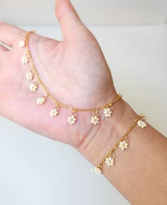 This seed bead flower bracelet is available in four lovely pastel shades: baby blue, light yellow, baby pink, and white. Pick your favorite color or collect all 4! Bracelet Length - approx. 6.5 inches (16.5 cm) with Extender chain - approx. 8 inches (20 cm) ⊹  Price is for ONE bracelet. ⊹  Since this is a handmade product, thread/string may be visible. ⊹  Colors may vary depending on the lighting and screen settings. ⊹  Each one is individually made so no two pieces are exactly the same.  ⊹  The Bracelet Ideas With Small Beads, Simple Flower Bracelet, Small Bead Bracelets Ideas, Small Bead Jewelry, Yellow Beaded Bracelets, Yellow Beads Jewelry, Seed Bead Flower Bracelet, Cute Beaded Jewelry, Small Beads Bracelet