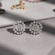 Simple-Dainty Wedding Earrings ✨💎 Double Shining, Double Sparking, Double Value! ✨ Heavy Rhodium plating over Sterling Silver Top Grade 5A Cubic Zirconia Diamond Alternatives Finished with a platinum look Free Shipping & Returns *Learn more Customization is welcomed 👍 Recommendations As an everyday earrings To accentuate your ear stack! As an anniversary ring 🎁 💎 Features RHODIUM PLATING: Rhodium is a hard metal and Rhodium plating beautifies and protects our fine sterling silver earrings. C Wedding Earrings With Brilliant Cut Cubic Zirconia, Wedding Crystal Earrings With Brilliant Cut, Dazzling Brilliant Cut Crystal Earrings For Wedding, Dazzling White Round Cut Bridal Earrings, Diamond White Round Flower Earrings For Formal Occasions, Diamond White Round Flower Earrings For Formal Events, Round Diamond White Flower Earrings For Formal Events, Dazzling White Cluster Earrings With Sparkling Stones, Dazzling Diamond White Flower Shaped Earrings