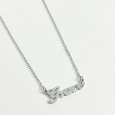 Our best selling personalised name necklace in silver is what we dream about. This necklace is the perfect every day name necklace. This silver name necklace is crafted from high quality stainless steel for a water and tarnish resistant finish. You can wear this custom piece every day. Day Name, Silver Name Necklace, Name Necklace, Initial Necklace, Personalized Jewelry, Initials, Every Day, Silver Rings, Stainless Steel