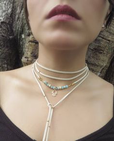 "Boho Hamsa Necklace, Yoga Jewelry, Delicate Choker Necklace, Gold Wrap Necklace, Minimalist Wrap Choker, Suede Choker, Boho Tie Up Necklace ❤ BUY ANY 2 ITEMS ANS GET 15% OFF!! (USE COUPON CODE '15OFF') ❤ ❤ BUY ANY 4 ITEMS ANS GET 20% OFF!! (USE COUPON CODE '20OFF') ❤ ❤ BUY ANY 6 ITEMS AND GET 25% OFF!! ((USE COUPON CODE '25OFF') ❤ Complete any outfit with this unique gorgeous fashionable and trendy delicate Hamsa choker wrap necklace ! Made from one long 3x1mm suede leather cord, 6mm faceted ro Minimalist Adjustable Layered Clavicle Necklace, Adjustable Minimalist Layered Choker Necklace, White Minimalist Layered Necklace With Adjustable Chain, Delicate Adjustable Layered Necklace With Clavicle Chain, Minimalist Adjustable Long Layered Necklace, Minimalist Long Adjustable Layered Necklace, Adjustable Long Layered Minimalist Necklace, Delicate Adjustable Clavicle Chain Layered Necklace, White Adjustable Chain Layered Choker Necklace