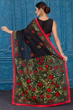 Beautiful black Phulkari work Kota saree is a perfect drape for special occasions. It comes with a matching blouse piece. Disclaimer: The shown stitched blouse on the model is for display purpose only. The saree comes with a matching blouse piece and finished with fall and piko. Festive Black Embroidered Pre-draped Saree, Black Art Silk Pre-draped Saree With Zari Weaving, Black Embroidered Pre-draped Saree For Navratri, Semi-stitched Black Art Silk Blouse Piece, Traditional Black Pre-draped Saree, Black Pre-draped Saree With Resham Embroidery, Black Embroidered Blouse Piece For Festive Occasions, Festive Black Embroidered Blouse Piece, Festive Embroidered Black Blouse Piece