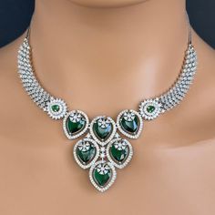 Emerald CZ diamond bridal necklace, American Diamond wedding necklace, Cz jewelry, Indian, Pakistani, and Punjabi wedding jewelry  Regular Size And Adjustable with rhodium finish Ships from California, USA Delivery in 2-5 business days in the USA. Other colors can be found here https://www.etsy.com/listing/1423096838/ruby-cz-diamond-bridal-necklace-american?ref=listings_manager_grid https://www.etsy.com/listing/1423097794/sapphire-cz-diamond-bridal-necklace?ref=listings_manager_grid Color, shade Cubic Zirconia Emerald Necklace For Wedding, Fine Jewelry Emerald Necklace With 17 Jewels For Wedding, White Gold Brilliant Cut Necklace For Wedding, Fine Jewelry Bridal Necklace With Crystals And Jewels, Dazzling Hand Set Emerald Necklace For Wedding, White Gold Cubic Zirconia Emerald Necklace For Anniversary, Dazzling Hand-set Emerald Necklace For Wedding, Wedding Emerald Necklace With Diamond Accents, Anniversary Emerald Necklace With Cubic Zirconia Jewels