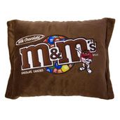 a chocolate m & m's pillow on a white background