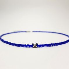 Blue choker necklace Dainty choker Star beaded necklace choker Beach choker Boho necklace Choker collar Silver star necklace choker The glass beaded star choker is 13 inches and can be adjusted up to 15 inches with a 2 inches extender chain. Made from 2mm tiny glass seed beads. This necklace has a dainty look and is crafted sturdy enough to wear every day. Every piece is made to order with care and love. ✓ HOW TO ORDER: ♥ Choose the color of your choice ♥ Choose the size of your choice ♥ If you Trendy Blue Choker With Tiny Beads, Adjustable Blue Beaded Star Necklaces, Adjustable Blue Star-shaped Beaded Necklace, Blue Adjustable Star-shaped Beaded Necklaces, Adjustable Star Charm Necklace For Summer, Blue Star-shaped Adjustable Necklace, Minimalist Blue Beaded Choker Necklaces, Minimalist Blue Beaded Choker Necklace, Blue Choker As Summer Gift