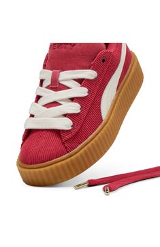 Defined by a chunky platform sole, an archival classic receives a bold revamp in this kid-size corduroy sneaker made in collab with Rihanna's FENTY label. Lace-up style Removable insole Textile and synthetic upper/synthetic lining and sole Imported Fenty X Puma Shoes, Fenty Puma Shoes, Puma Creepers, Daily Uniform, Puma X Fenty, Club Red, Fenty X Puma, Color Club, Black Puma