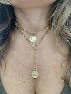 "Lovely 14k yellow gold coin medallion choker. This choker is a great statement piece that can transition any outfit from day to night. The 17\" choker secures with a lobster clasp that can be adjusted anywhere from 13\"-17\", making it great for layering! *Approximate weight: 8.1 grams *Adjustable length: 13\"-17\" Upgrades for FedEx/UPS guaranteed 2-day delivery are available and can be selected prior to checkout without separate invoicing. It is generally not an issue, but the USPS cannot gua Elegant Gold-tone Coin Necklace, Luxury Gold Coin Medallion Necklace, Elegant Coin Necklace With Clavicle Chain, Elegant Clavicle Chain Coin Necklace, Elegant Clavicle Coin Necklace, Luxury Gold Plated Coin Necklace, Luxury Gold Coin Pendant Necklace, Yellow Gold Coin Necklace With Clavicle Chain, Elegant Gold Coin Choker Necklace