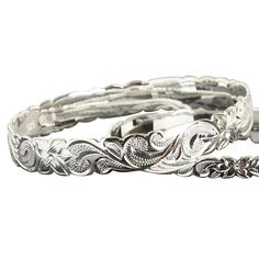 Solid 925 Sterling Silver Queen Scroll Cut Out Edge BangleItem Number: B1052All weights and measurements are approximate and may vary slightly from listed information as below:Weight: 14.5-48 gramBand Width: 6mm, 8mm, 10mm, 12mmMaterial: 925 Sterling SilverThis beautiful bangle is made with 925 (92.5%) Sterling Silver which is the highest concentration of silver allowed in jewelry. Laser engravings are for the inside of the bangle ONLY. Once an item has been engraved it cannot be exchanged or re Classic Adjustable Sterling Silver Bracelet With Intricate Design, Silver Bangle With Sterling Silver Clasp, Classic Adjustable Bracelet With Intricate Design, Classic Adjustable Hallmarked Bangle, Classic Adjustable Etched Bangle, Silver Bracelets With Intricate Design, Classic Etched Sterling Silver Bracelet, Classic Nickel-free Round Bangle, Classic Silver Bangle With Intricate Design