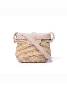 The Jabu Basket Bag in romantic pink quartz is sturdy, versatile and timeless. Handwoven in Eswatini, this woven basket bag is made from lutindzi grass – indigenous to Eswatini – and locally grown sisal fibre. The bag features a cuoio pink leather lid, gold hardware and hand carved cow horn details. Perfect for weddings, travelling, or an every day spring/ summer handbag. Natural Woven Leather Top Handle Bag, Beige Straw Bag With Woven Leather Top Handle, Natural Woven Leather Crossbody Straw Bag, Eco-friendly Straw Bucket Bag With Woven Leather, Chic Handwoven Natural Fiber Bucket Bag, Natural Woven Leather Bucket Bag, Natural Leather Woven Bucket Bag, Beige Woven Leather Basket Bucket Bag, Beige Woven Leather Bucket Bag