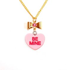 "This kawaii conversation heart faux candy necklace makes a perfect gift for a friend or any woman for valentine's day or even yourself to dress up for lovecore season! Handmade & comes on your choice of stainless steel chain or gold finish chain. Includes a free gift box! Details:    - 3/4\" candy heart charm     -18\" hypoallergenic stainless steel or gold finish necklace with or without bow     -choose between 5 pastel colors and 2 messages     -handmade item     -matching earrings available just search for \"conversation heart\" in my shop When you think of Valentine's Day, you have to think conversation hearts and I made these necklaces to look just like the real candies!  **Made to order - please allow 2 weeks for your item to be made before shipment** Every order comes with free gif Cheap Pink Charm Necklaces For Friendship, Affordable Kawaii Jewelry For Parties, Cheap Kawaii Heart-shaped Jewelry, Valentine's Day Charm Necklaces For Friendship, Conversation Heart Necklace, Pastel Candy, Conversation Heart, Candy Necklaces, Wrist Jewelry