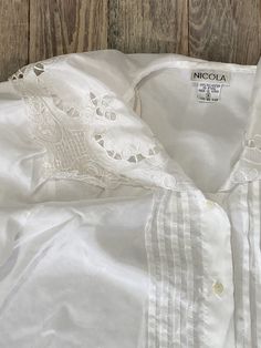 "Neck shall Polyester  Flowy  Embroidered cut  Size 8 Sleeve 22\" Chest 18\" Length 24\" Follow us on IG @inezandberyl" Spring Collared Shirt With Lace Trim, Collared Shirt With Lace Trim For Spring, Summer Workwear Blouse With Floral Embroidery, Floral Embroidered Summer Workwear Blouse, Summer Daywear Blouse With Lace Collar, Summer Floral Embroidery Workwear Blouse, Summer Floral Embroidery Work Blouse, Summer V-neck Blouse With Lace Collar, Summer Daywear Shirt With Lace Trim