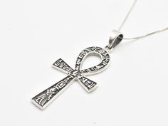 Ankh Cross Pendant made of Solid 925 Sterling Silver ☞ made to last.Matching Ring & Earrings ☞ please ask meDetails:• Silver Ankh Pendant• Dimensions: Pendant Height 55mm, Width 23mm• Free Complimentary Chain• Solid 925 Sterling SilverSKU P-01188 Symbolic Ankh Ceremonial Jewelry, Symbolic Engraved Ankh Jewelry, Silver Cross Jewelry For Ceremonial Occasions, Ceremonial Silver Cross Jewelry, Symbolic Hallmarked Cross Jewelry, Symbolic Hallmarked Jewelry For Ceremonial Occasions, Ceremonial Sterling Silver Amulet Jewelry, Sterling Silver Ankh Amulet Jewelry, Sterling Silver Etched Jewelry For Ceremonial Occasions