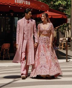 Embrace regal sophistication with our pink sherwani set, featuring intricate hand crystal work embroidery that adds a touch of opulence. Crafted from luxurious raw silk, the sherwani exudes timeless charm and elegance. It is perfectly complemented by a linen silk kurta and pant, blending modern style with classic refinement. Complete the ensemble with a delicate organza dupatta, which adds a graceful finishing touch to this distinguished and elegant look. Pink Sherwani, Indian Bridal Couture, Kurta Lehenga, Crystal Work, Modern Groom, Waistcoat Woman, Wedding Sari, Pink Embroidery, Silk Kurta