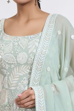 Mint green kurta with floral sequin and thread embroidery. Paired with a sharara and embroidered dupatta. - Aza Fashions Green Sharara With Floral Embroidery, Green Floral Embroidered Sharara, Green Palazzo Set With Resham Embroidery For Summer, Spring Green Sharara With Floral Embroidery, Elegant Green Sharara With Floral Embroidery, Fitted Green Choli Straight Kurta, Green Chikankari Embroidered Palazzo Set For Reception, Green Sharara With Zari Work For Spring, Green Palazzo Set With Chikankari Embroidery For Reception