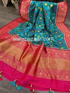 Gorgeous Patola dupatta with a grand Banarsi zari border. SILK MARK CERTIFIED Gorgeous weaving on a luxurious fabric. Size : 100 inches by 45 inches Luxury Bollywood Style Silk Mark Certified Dupatta, Luxury Silk Dupatta With Zari Weaving, Saree-shaped Dupatta With Border For Celebration, Celebration Dupatta With Border For Saree, Blue Katan Silk Dupatta With Printed Border, Blue Bollywood Dupatta With Border, Blue Dupatta With Border For Diwali, Festive Blue Dupatta With Border, Festival Celebration Saree With Border