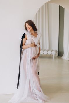 "💖 Whether you're looking for a chic maternity gown for your photo shoot or a stunning dress for a special event, this tulle maternity gown is the perfect choice. It is tailored to your custom measurements to ensure a perfect fit, making you feel comfortable and confident throughout the event.    💖 With its timeless elegance and understated sophistication, this renaissance dress is the perfect choice for any occasion. The dress is made from high-quality tulle fabric, giving it a light and airy Summer Maternity Flowy Gown, Photo Shoot Plus Size, Sheer Ruffle Dress, Sheer Tulle Dress, Photo Shoot Style, Tulle Maternity Dress, Plus Size Gown, Boho Maternity Dress, Intimate Maternity