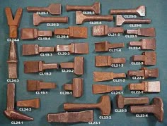 an assortment of woodworking tools displayed on a blue table top with numbers and measurements