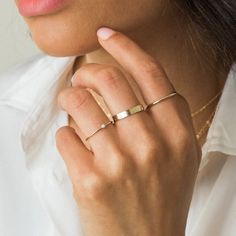 Our Essential Stacking Ring is the perfect go-to everyday ring. It's the wider version of our Simple Stacking Ring! Its simple style makes it perfect for anyone who wants a minimalist look. You can wear it 24/7 - even in the shower & to sleep! DETAILS 14k gold filled ring 1.5mm band Available in sizes 5-9 Layering Essentials, Simple Stacking Rings, Dainty Initial Necklace, Dainty Rings, Multiple Rings, Opal Ring Gold, Ball Chain Necklace, Chic Earrings, Gold Ring Sets