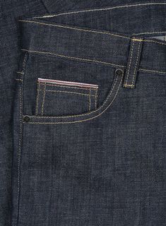 Brace yourselves for an exclusive denim delight – introducing our first-ever Selvedge Denim Jeans – the ultimate fusion of chic vibes and unwavering durability! Woven from the finest cotton, renowned for their rugged charm and unbeatable staying power. These jeans flaunt the iconic 'self-edge' or selvedge – a neat, tightly woven strip hugging the denim's edge. It's not just a pair of jeans; it's a statement, a nod to tradition, and an ode to denim passion. So, whether you're a pure denim lover o Cotton Jeans With Contrast Stitching, Modern Denim Jeans With Welt Pockets, Modern Jeans With Welt Pockets, Classic Relaxed Fit Jeans With Contrast Stitching, Classic Medium Wash Jeans With Contrast Stitching, Fitted Cotton Jeans With Contrast Stitching, Everyday Cotton Bottoms With Contrast Stitching, Dark Wash Jeans With Welt Pockets In Rigid Denim, Classic Cotton Jeans