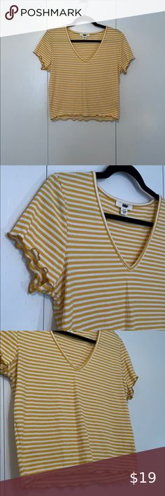 Striped Crop Top -brand new, never worn -perfect condition -gotten crop top with cute detailing on hems -comfortable and stretchy material -ribbed material -fitted crop top -good for layering -yellow and white stripes -shirtsleeved -v-neck Tops Crop Tops Gold Sequin Crop Top, Peplum Crop Top, Athletic Crop Top, Purple Crop Top, Black Lace Shorts, Velvet Crop Top, Strapless Crop Top, Sequin Crop Top, Wrap Crop Tops