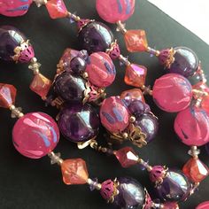 ON SALE Purple pink Lucite beaded Hong Kong signed matching jewelry set 1950s 1960s collectible necklace earrings in very good vintage condition. Earrings are approximately 1 inch round and the necklace is 26 inches long. A really nice matching set perfect for any outfit. Vintage Purple Round Jewelry, Purple Vintage Jewelry For Party, Vintage Round Spacer Beads Jewelry, Purple Round Beads Costume Jewelry, Purple Round Beaded Costume Jewelry, Purple Round Bead Costume Jewelry, Pink Round Costume Jewelry, Purple Beaded Costume Jewelry, Purple Round Beads Jewelry For Party