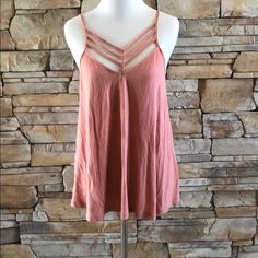 Express Strappy Top. Brand New With Tag. Split Hem, Slightly Longer In Back. Modal Cotton/Polyester/Spandex. Light Salmon Color. Would Also Fit A Medium. Runs Big. Casual Strappy Tank Top For Summer, Trendy Strappy Tank Top For Beach, Spring V-neck Tops With Crisscross Straps, Spring V-neck Tank Top With Crisscross Straps, V-neck Tank Top With Crisscross Straps For Spring, Summer V-neck Top With Crisscross Straps, Sleeveless Tops With Crisscross Straps For Vacation, Summer Tops With Straps For Brunch, Vacation Tops With Crisscross Spaghetti Straps