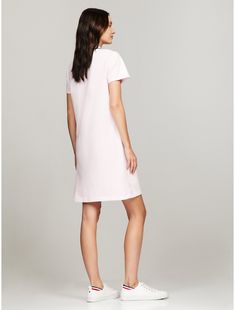 Tommy Hilfiger women's dress. It's everything you love about our polos—styled as a dress and made from soft, comfortable stretch cotton.  Material: 97% Cotton, 3% Elastane. Pink Relaxed Fit Dress, Casual V-neck Polo Dress For Spring, Casual Tommy Hilfiger Day Dresses, Tommy Hilfiger Casual Day Dresses, Spring Knee-length T-shirt Dress For Loungewear, Spring Loungewear Mini Dress, Chic Cotton Midi Dress For Loungewear, Cotton Shift Mini Dress, Knee-length, Knee-length Cotton Shift Midi Dress