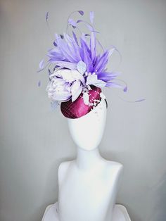 From the 2024 Featured Milliner of the Kentucky Derby Museum  Gorgeous Kentucky Derby hat fascinator  kentucky derby hat fascinator purple magenta satin with lavender flower with purple feathers beaded flower decor headband attachment.  each hat is totally one of a kind! no two are alike! * I can add feathers or flowers to any existing hat to help customize your look for a small fee. Message me for requests, I am happy to help!  *All hats are sold as displayed. No returns do to nature of product Luxury Purple Mini Hats For Races, Purple Feather Headpieces For Spring, Purple Fascinator With Handmade Flowers For Parties, Purple Feathered Wedding Fascinator, Purple Feather Fascinator For Wedding, Purple Feathered Mini Hat For Wedding, Purple Party Fascinator With Handmade Flowers, Purple Feather Mini Hat For Wedding, Purple Handmade Flowers Fascinator For Party