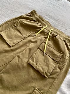 Brand Name: GotmesApplicable Season: Four SeasonsPant Style: Cargo PantsMaterial: COTTONWaist Type: MIDFit Type: LOOSEWaist Size(in inches): 2.23 - 2.62Gender: MENModel Number: CK-42Fabric Type: BroadclothClosure Type: DrawstringColor: green, black, khaki Jogger Pants Style, Buckle Pants, Black China, Fashion Trousers, Green China, Casual Joggers, Men Pants, Style Cargo, Hip Hop Streetwear