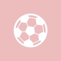 a white soccer ball on a pink background