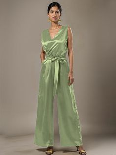 This soft satin jumpsuit features a flattering v-neck design, making it the perfect choice for mothers of the bride. Its dress pantsuit style provides comfort and elegance, while its high-quality material ensures a polished look. Stay stylish and comfortable on that special day with our jumpsuit. Dress Pantsuit, Mother Of The Bride Looks, Satin Belt, Satin Jumpsuit, Bride Look, Mother Of The Bride Dress, Groom Dress, Satin Material, Mother Of The Groom