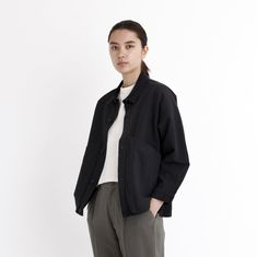 A shirt jacket with a utilitarian touch. Features a paneled construction, spread collar, and button placket. The design is anchored by two oversized gusseted side pockets. Relaxed fit. A staple for transitioning seasons. + Details Color: Black 55% Linen, 45% Cotton XS, S, M, L, XL Julie is 5'9" and wearing a size S Junho is 6'0" and wearing a size S Hand wash cold, lay flat to dry. Do not tumble dry. Can be dry cleaned. + Material A mid-weight woven 55% Linen, 45% Cotton material. This material Collared Workwear Tops With Multiple Pockets, Modern Workwear Outerwear With Multiple Pockets, Utility Long Sleeve Shacket For Workwear, Collared Work Tops With Multiple Pockets, Collared Tops With Multiple Pockets For Work, Modern Multi-pocket Work Outerwear, Everyday Utility Shacket With Multiple Pockets, Oversized Workwear Shacket With Flap Pockets, Oversized Shacket With Flap Pockets For Work