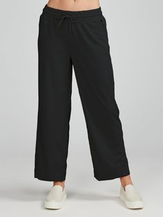 The Weekend Wide Leg Pant is your go-to choice for laid-back days. Crafted from lightweight fabric, it offers optimal comfort and freedom of movement. Its wide leg design ensures a relaxed fit, making it perfect for casual outings and leisurely strolls. With its versatility and effortless style, it's an essential addition to your wardrobe. It's also available with a shorter 22" inseam. Versatile Wide Leg Pants With Pull-on Style, Casual Stretch Wide Leg Pants With Straight Hem, Casual Wide Leg Bottoms With 4-way Stretch, Casual Wide-leg Bottoms With 4-way Stretch, Casual Solid Wide Leg Pants With 4-way Stretch, Versatile Pants With Loosely Fitted Hips For Elevated Casual, Versatile Straight Leg Sweatpants, Casual Straight Pants With 4-way Stretch, Versatile Wide Leg Pull-on Pants