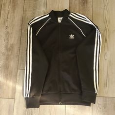 For Sale: Adidas Adicolor Classics Sst Track Jacket (Size M, Black) Brand New, No Tags Black With Signature White Stripes Medium Size Full Zip-Up With Two Pockets Original Price: $89 Cash Only, Please Smoke And Pet-Free Home Fall Track Jacket With Side Stripes, Fall Track Jacket With Side Stripes And Long Sleeves, Casual Spring Outerwear With Side Stripes, Casual Winter Outerwear With Side Stripes, Casual Long Sleeve Outerwear With Side Stripes, Casual Track Jacket With Contrast Stripes, Casual White Track Jacket With Side Stripes, Adidas Outerwear With Side Stripes For Fall, Casual Three Stripes Outerwear For Fall