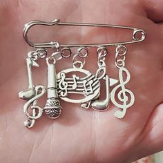 New Just Made ,This Is Handmade In My Jewelry Studio And Can Be Made Different Than It Is, I Have Alot Of Different Music Charms That Could Be Added, I Have This In Bronze Too. I Have All Kinds Of Musical Instruments That Could Be Added. Perfect Gift For The Music Person In Your Life. This Is Silver Tone Not 925 Sterling Stamped. I Can Make Matching Earrings Or Necklace To Match This With Stamped 925 Earhooks Or Sterling Necklace Chain. This Is For The Brooch Pin With Musical Notes And A Microph Pin Charms, Music Note Necklace, Repurposed Necklace, Sterling Necklace, Charm Holder, Sterling Necklaces, Musical Notes, Music Themed, Jewelry Studio