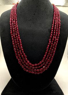 Item Name Natural Bangkok Ruby Beads Necklace, Ruby 4 Stand Beautiful Necklace, Precious Ruby Smooth Oval Beads Necklace Set, Ruby Beads Necklace  : Some Of The Sizes Are Ready To Ship. Product             :     Necklace Set Band Color       :     Gold  Gemstone        :     Natural Bangkok Ruby  Chain Style      :     Beads    . Luxury Oval Beads Beaded Necklace For Gift, Luxury Ruby Temple Necklace, Elegant Oval Gemstone Beads, Traditional Red Gemstone Beaded Necklace, Red Ruby Round Beaded Necklaces, Red Ruby Beaded Necklaces With Polished Beads, Red Ruby Beaded Necklace With Polished Beads, Red Rondelle Jewelry With Large Beads, Red Gemstone Beads For Jewelry Making