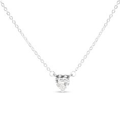 Indulge in the exquisite allure of this heart-shaped pendant necklace. Glistening with a brilliant 1.0 cttw of lab-grown diamonds, this pendant is crafted from 14K white gold, exuding a timeless and luxurious look. The single diamond is precisely set in a 3-prong setting, maximizing its fire and sparkle. The F-G color and VS1-VS2 clarity of the diamond enhance its radiance and beauty, making it a stunning addition to your jewelry collection. This heart stud pendant hangs elegantly from an 18-inc Brilliant Cut Diamond White Solitaire Necklace With Heart Pendant, Diamond White Solitaire Necklace With Brilliant Cut Heart Pendant, Diamond White Heart Solitaire Necklace, Heart Cut Cubic Zirconia Solitaire Necklace For Anniversary, Fine Jewelry Heart Cut Solitaire Necklace, Heart Shaped Solitaire Necklace Vvs Clarity, Heart Cut Solitaire Necklace Fine Jewelry, Heart Cut Diamond Solitaire Necklace In Fine Jewelry Style, White Cubic Zirconia Solitaire Heart Pendant Necklace