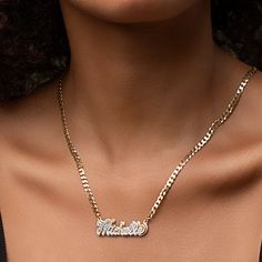 Our popular Double Plated Iced Out Script Name Necklace boasts a chic and elegant design, handcrafted to perfection. The model showcases the necklace with an 18-inch Cuban chain (see image for reference). Chain width:Cuban Chain - 3.7 mmFigaro Chain - 3 mm Closure: All chains are fitted with a lobster clasp. Metal Selection: Gold Plated Silver Plated Sterling silver 14k gold plated over sterling silver 10k solid gold - (NAMEPLATE ONLY)14k solid gold - (NAMEPLATE ONLY) Curb Chain Pendant Necklace, Elegant Personalized Metal Chain Necklace, Elegant Personalized Link Necklaces, Gold Nameplate Chain Jewelry, Elegant Name Necklace With Figaro Chain For Anniversary, Figaro Chain Nameplate Jewelry For Anniversary, Elegant Figaro Chain Name Necklace For Anniversary, Anniversary Jewelry With Adjustable Cuban Link Chain, Anniversary Cuban Link Necklace With Adjustable Chain