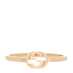 This is an authentic GUCCI 18K Yellow Gold Interlocking G Ring size 50 or 5.5.The ring is crafted of 18 karat yellow gold and features the Gucci GG logo. Gold Gucci Ring, Luxury Gold-plated Jewelry With Gold-tone Logo, Luxury 14k Gold-tone Rings, Gucci Yellow Gold Rings For Formal Occasions, Designer Polished Gold Rings, Designer Gold Ring With Polished Finish, Designer Gold Rings With Polished Finish, Gucci Rings With Polished Finish For Formal Occasions, Gucci Designer Rings In 14k Gold