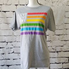 Show Them It's All About The Love With This Nwt Jem Collective Tee In Gray. In A Standard Men's Size Small, This Top Is Unisex And Can Work For Anyone Regardless Of How They May Identify. - Crewneck - Graphic At Front - Cotton - Machine Washable Condition Is New With Tags. Never Worn. Smoke-Free Home. Pride. Lgbtq. Trans Lives Matter. Cotton Tops For Pride, Casual Cotton T-shirt For Pride, Crew Neck Cotton Top For Pride, Casual Text Print Top For Pride, Cotton Crew Neck Shirt For Pride, Pride Cotton Graphic Tee, Cotton Graphic Tee For Pride, Cotton Graphic Tee For Pride Festival, Casual Pre-shrunk Shirt For Pride