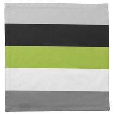 a green and black striped napkin on a white background