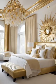 a large bed sitting in a bedroom under a chandelier next to a window