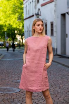 Light rose linen summer dress. Washed and soft linen dress.  Looks perfect on every woman!  This dress is made of 100% washed, natural Baltic linen (EU) GIFT - FREE SHIPPING WORLDWIDE * ENLI5 Linen - it's our family creation... for you with love... _ DESCRIPTION  - made from 100% Baltic linen - dress has two comfortable pockets  - model height is 5.7ft (174 cm.) she wears size M - handmade by ENLI5 Linen family in Lithuania (EU) - Color may vary due to different displays * WHY TO CHOOSE US? Every dress is made individually for our clients. If you need small changes in size, please write us a message and together we would find the solution. Our linen is twice washed, so it gets better shape, stylish wrinkles and  indescribable tenderness.  Do not forget that if you really want our products, Summer Linen A-line Sleeveless Dress, Sleeveless Pink Linen Dress For Summer, Pink Linen Dress For Summer, Pink Sleeveless Linen Dress, Sleeveless Linen Dress In Flax Color, Flax Sleeveless Linen Dress, Sleeveless Flax Linen Dress, Flax Sleeveless Casual Dress, Summer Sleeveless Knee-length Linen Dress