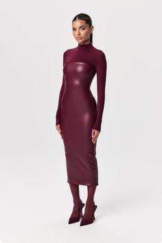 Our stretchy faux leather midi dress is a winter essential. Features a tube design with a straight neckline and a body-con finish. Back zipper closure makes it simple to put on. Style with our amazing boots and coats to create must-have outfits. Vegan Leather Collection Import Self: 60% PU, 35% Rayon, 5% Spandex Lining: 80% Nylon, 20% Spandex Model wears size XS True to size Unusual Fashion, Tube Midi Dress, Bday Dress, Leather Midi Dress, Burgundy Midi Dress, Hat Jewelry, Tube Design, Leather Outfits, Swim Shop