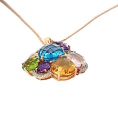 Gorgeously crafted with 14K Rose Gold, this shimmering necklace features a stunning combination of precious diamonds, amethyst, citrine, blue topaz, and peridot. Revel in luxe elegance and make a statement with this timeless piece! Jewelry Style : Pendant w/ Chain Metal Type : 14K Rose GoldBrand : EffyStone Type : Multi StoneMulti Stone Weight : 12 ctwDiamond Stone Weight : 0.14 ctwColor : H-IClarity : SI2-I1 Elegant Multicolor Gemstone Pendant, Elegant Multicolor Pendant Gemstones, Multi Gemstone Necklace, Chain Diamond, Jewelry Style, Multi Stone, Stone Pendants, Gemstone Necklace, Blue Topaz