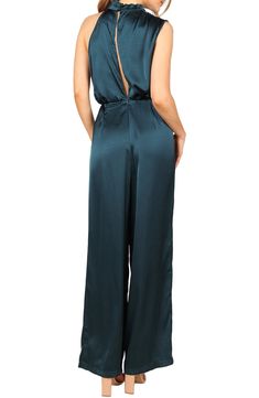 This glamorous satin jumpsuit is designed with soft bodice pleats and a sleek cutaway shoulder. Back keyhole with button-and-loop closure Mock neck Sleeveless Unlined 95% polyester, 5% elastane Hand wash, dry flat Imported Elegant Spring Jumpsuits And Rompers With Back Opening, Elegant Fitted Satin Jumpsuits And Rompers, Chic Fitted Satin Jumpsuits And Rompers, Teal Jumpsuit Outfit, Elegant Solid Color Backless Strapless Jumpsuit, Spring Evening Satin Jumpsuits And Rompers, Summer Satin Jumpsuit For Date Night, Elegant Satin Jumpsuits And Rompers For Workwear, Elegant Backless Jumpsuits For Date Night