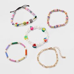 Accessorize your kid's ensemble using this Girls' 5pk Fruit and Smiley Bracelet Set by art class™. It features vibrant fruit and smiley face charms that can be worn with many outfits. The comfortable 6.5-inch length and a mix of lobster claw clasp and pull-on styles, this set ensures easy wear and a secure fit. Whether it��’s a party or a fashion show, these fruit and smiley bracelets are a great addition to any young fashionista's collection. Art Class™: One-of-a-kind looks for the one and only y Beaded Bracelets With Smiley Face, Smiley Bracelet, Target Art, Class Jewelry, Beaded Fruit, Fruit Bracelet, Clay Bracelets, Vbs 2024, Kandi Bracelets