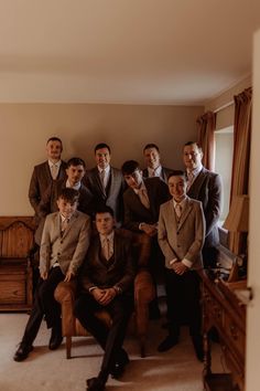 Groomsmen in brown three piece suits and rings bearers in lighter neutral suit for rustic barn wedding Old School Groomsmen Attire, Neutral October Wedding, Shades Of Brown Groomsmen Suits, Chocolate Brown Groomsmen Attire, Dark Brown Groomsmen Attire, Dark Brown Groomsmen Suits, Groomsmen Brown Suits, Groomsmen Mismatched Suits, Brown Suit Groomsmen