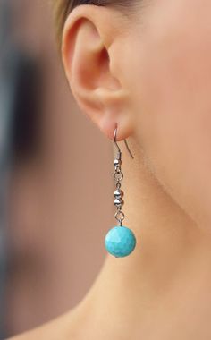 Modern gemstone earrings was made of natural turquoise stone faceted 12 mm beads,high quality steel chain and stainless steel earring hooks. Earring hooks are nickel and lead free. *The total lenght of earrings is 52 mm approx including the earring hooks. Other earrings of my shop you can see here: https://www.etsy.com/shop/NaTavelli?section_id=13757927 Thanks for visit! Faceted Beaded Earrings With Round Beads As Gift, Faceted Round Bead Earrings As Gift, Faceted Round Beaded Earrings As Gift, Czech Glass Dangle Beaded Earrings With Faceted Beads, Adjustable Faceted Round Bead Earrings, Adjustable Faceted Beaded Drop Earrings, Czech Glass Dangle Jewelry With Faceted Beads, Faceted Czech Glass Dangle Jewelry, Faceted Czech Glass Dangle Earrings